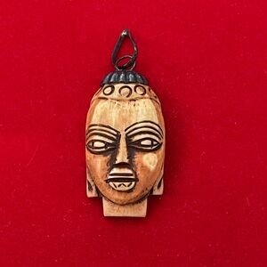 Vintage  hand carved African pendant